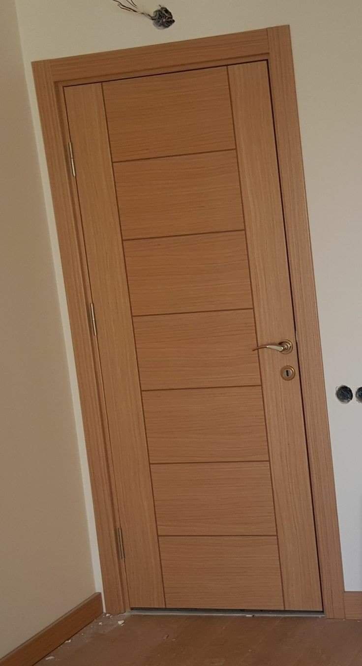 تفصيل أبواب سنديان وسويدي بأشكال مميزة ودهانات مقاومة للعوامل الجوية